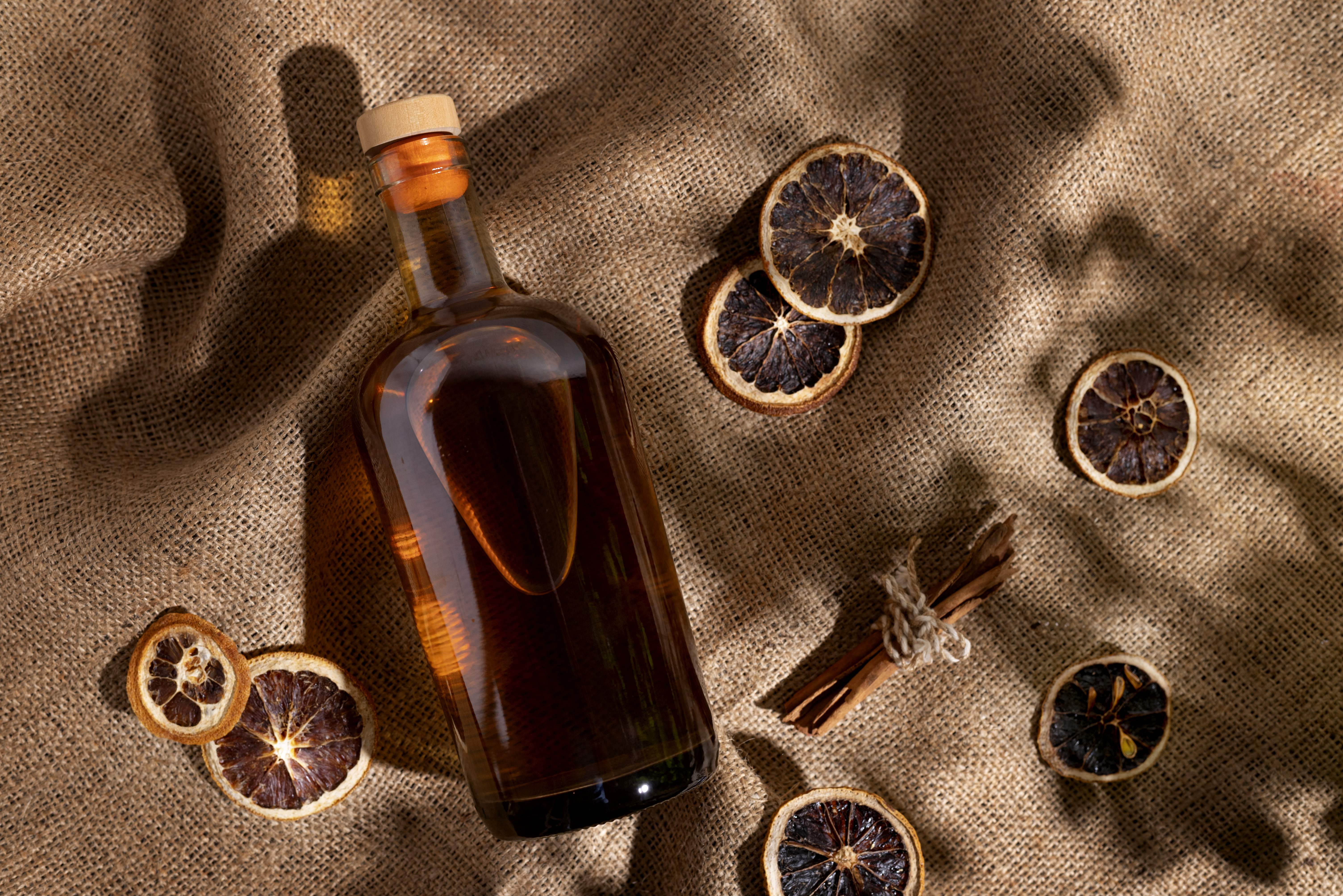  hand-picking-up-rusty-nail-cocktail-glass_1